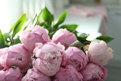Photo of Bouquet of beautiful fresh pink peonies indoors, closeup