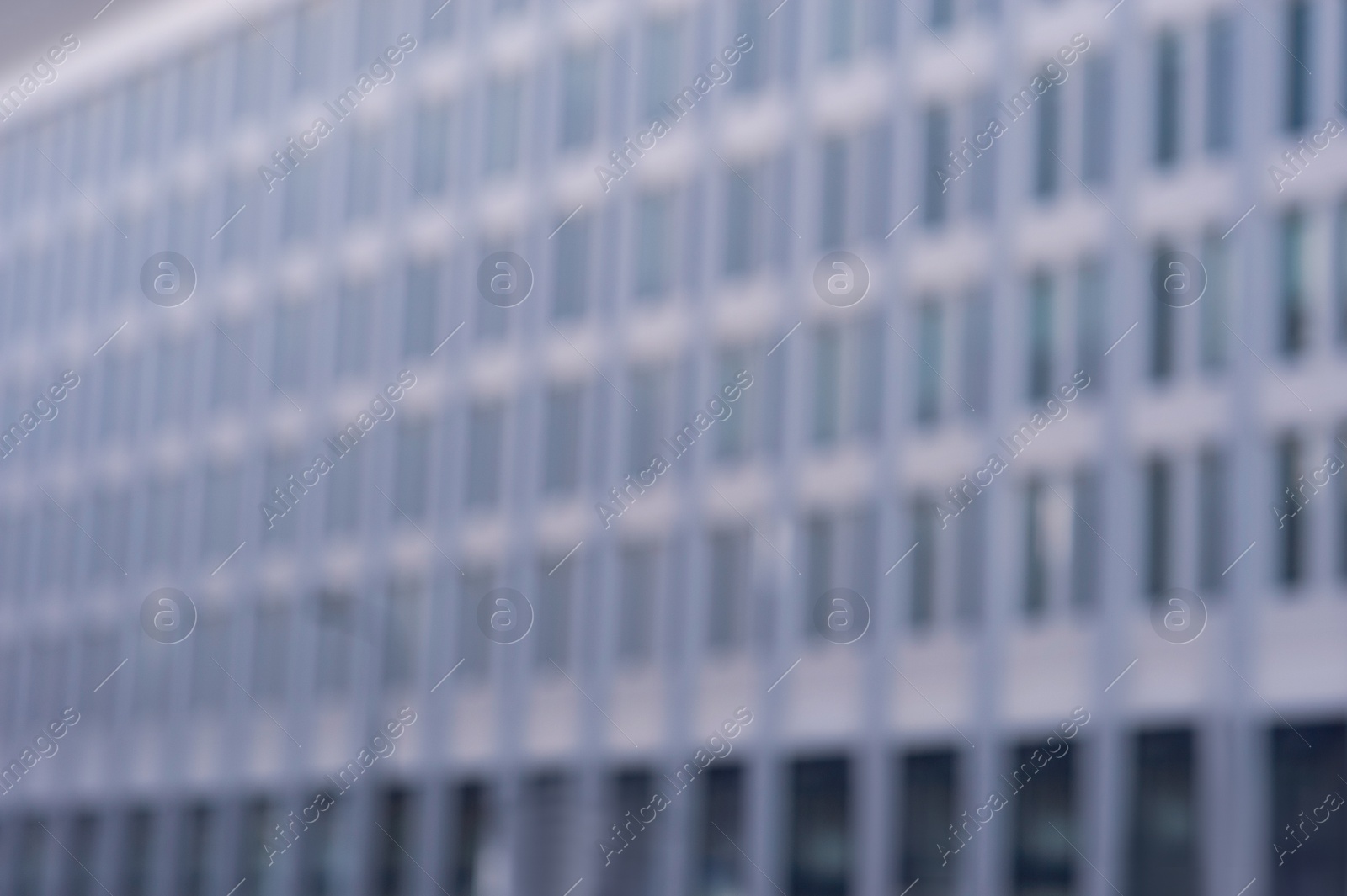 Photo of Blurred view of modern building on sunny day