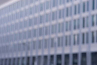 Blurred view of modern building on sunny day