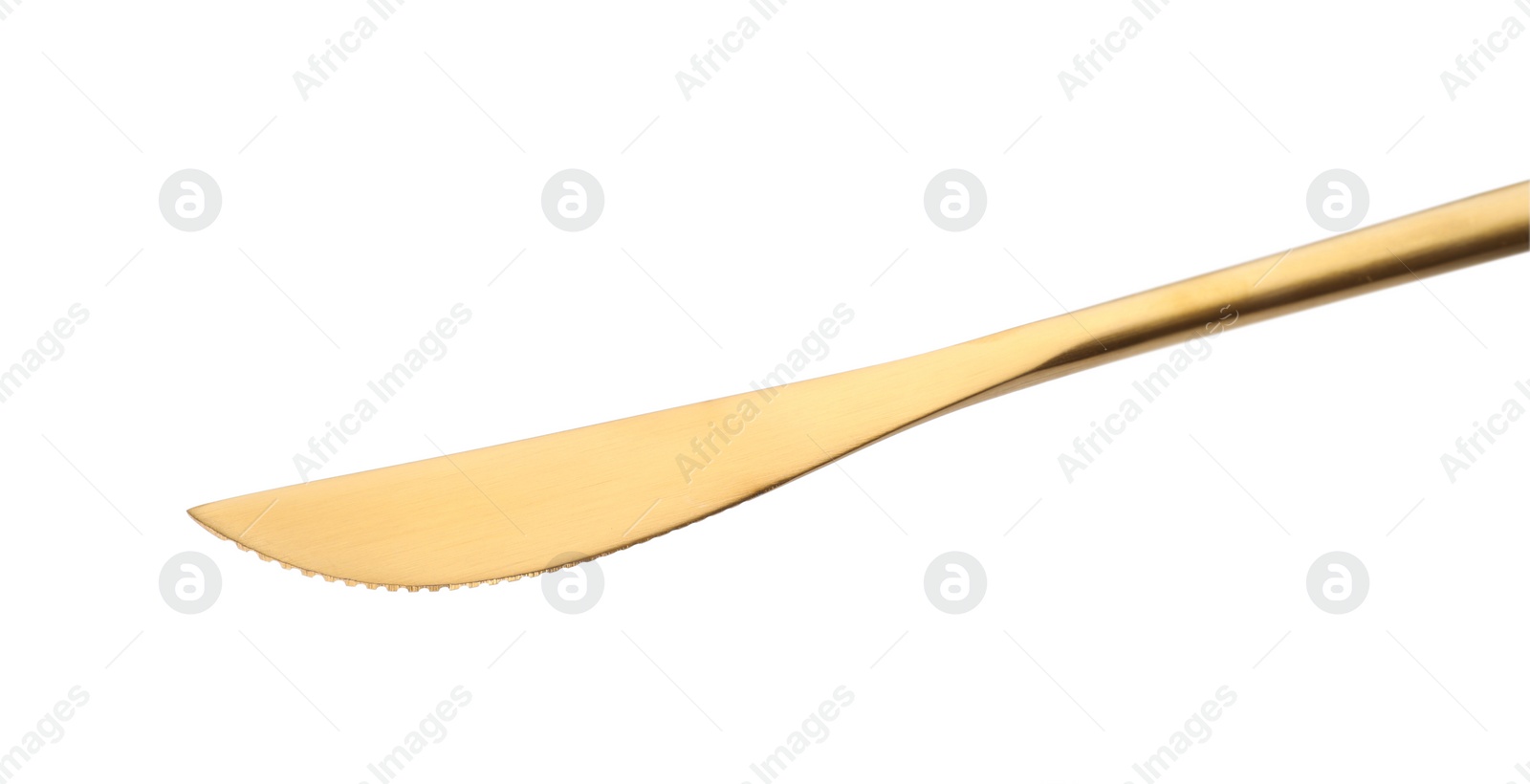 Photo of One golden knife isolated on white. Piece of cutlery