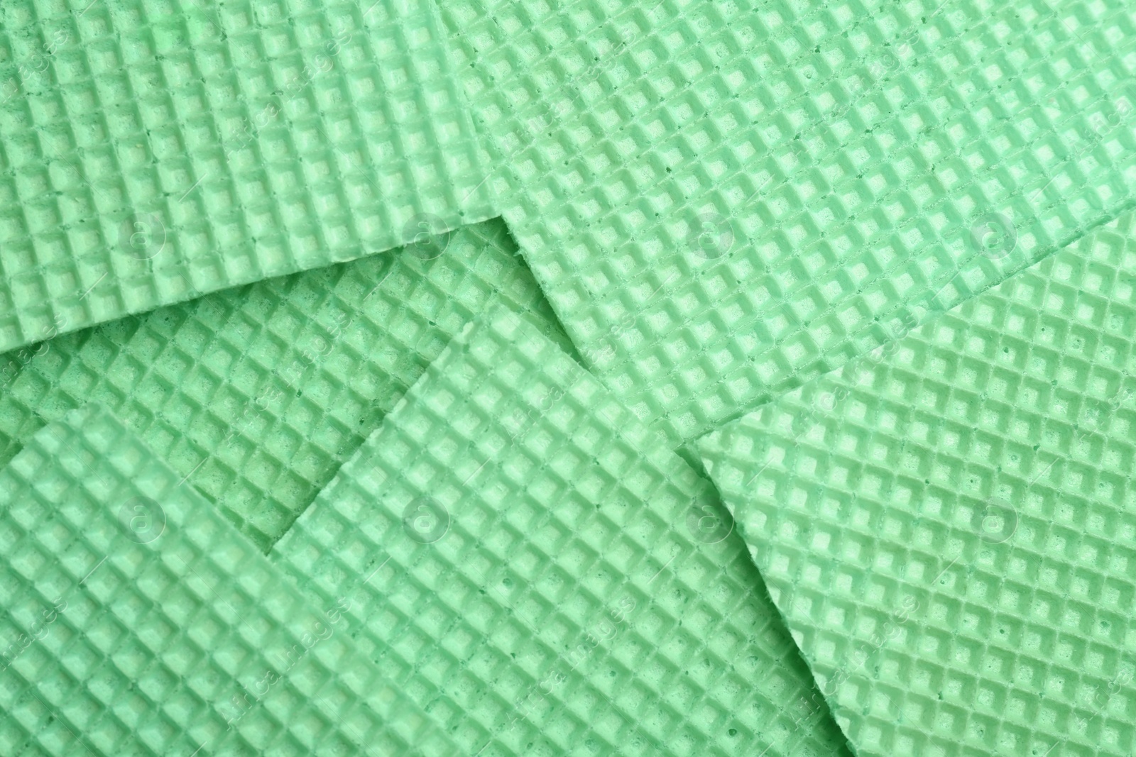 Photo of Tasty wafers as background, closeup. Crispy food