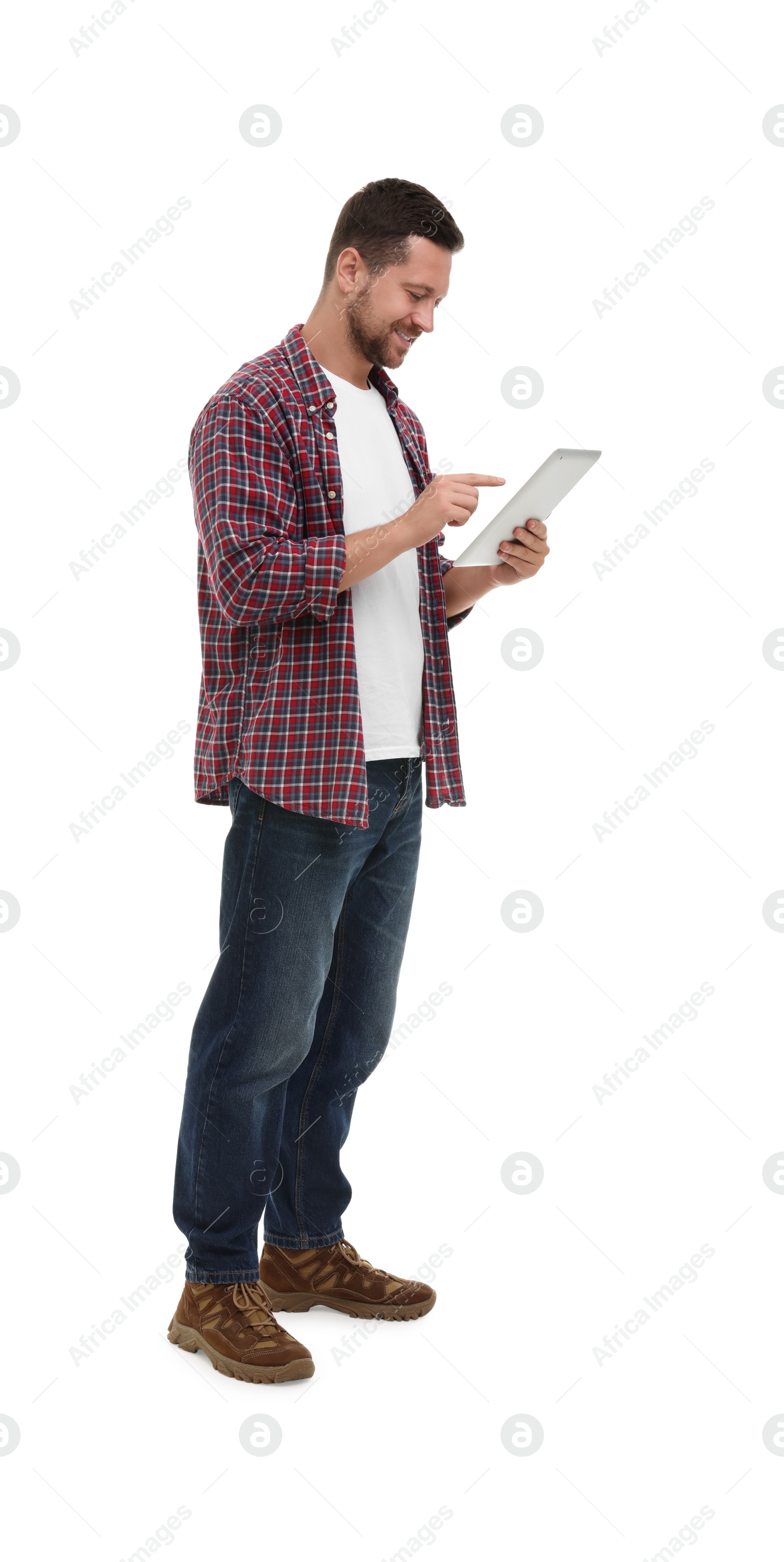 Photo of Happy man using tablet on white background