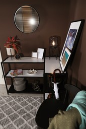 Hallway interior with console table and stylish decor