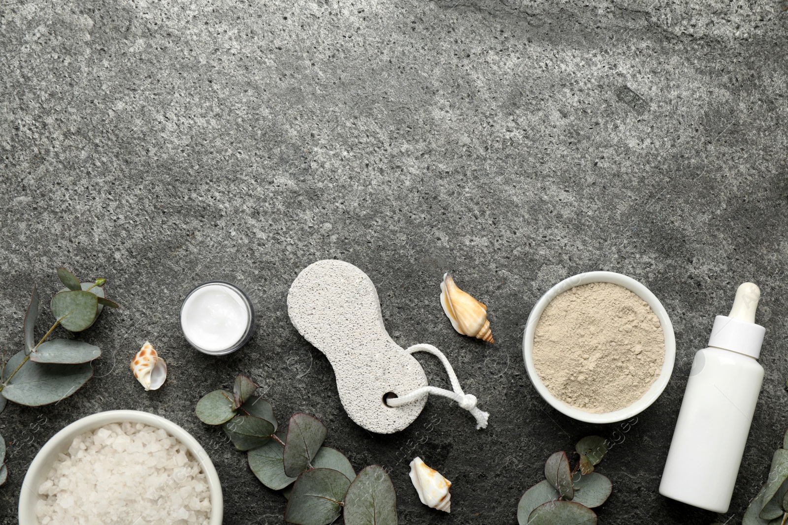 Photo of Flat lay composition with pumice stone on grey background. Space for text