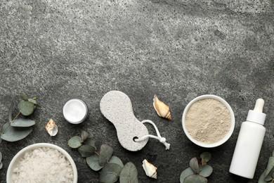 Flat lay composition with pumice stone on grey background. Space for text