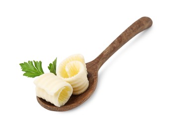 Tasty butter curls and fresh parsley in spoon isolated on white