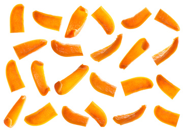 Set of cut ripe orange bell peppers on white background