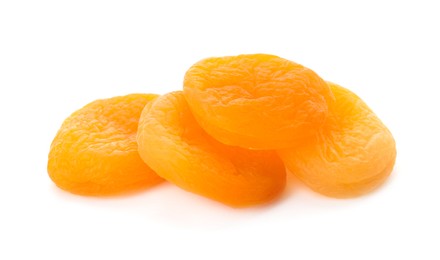 Photo of Pile of tasty apricots on white background. Dried fruits