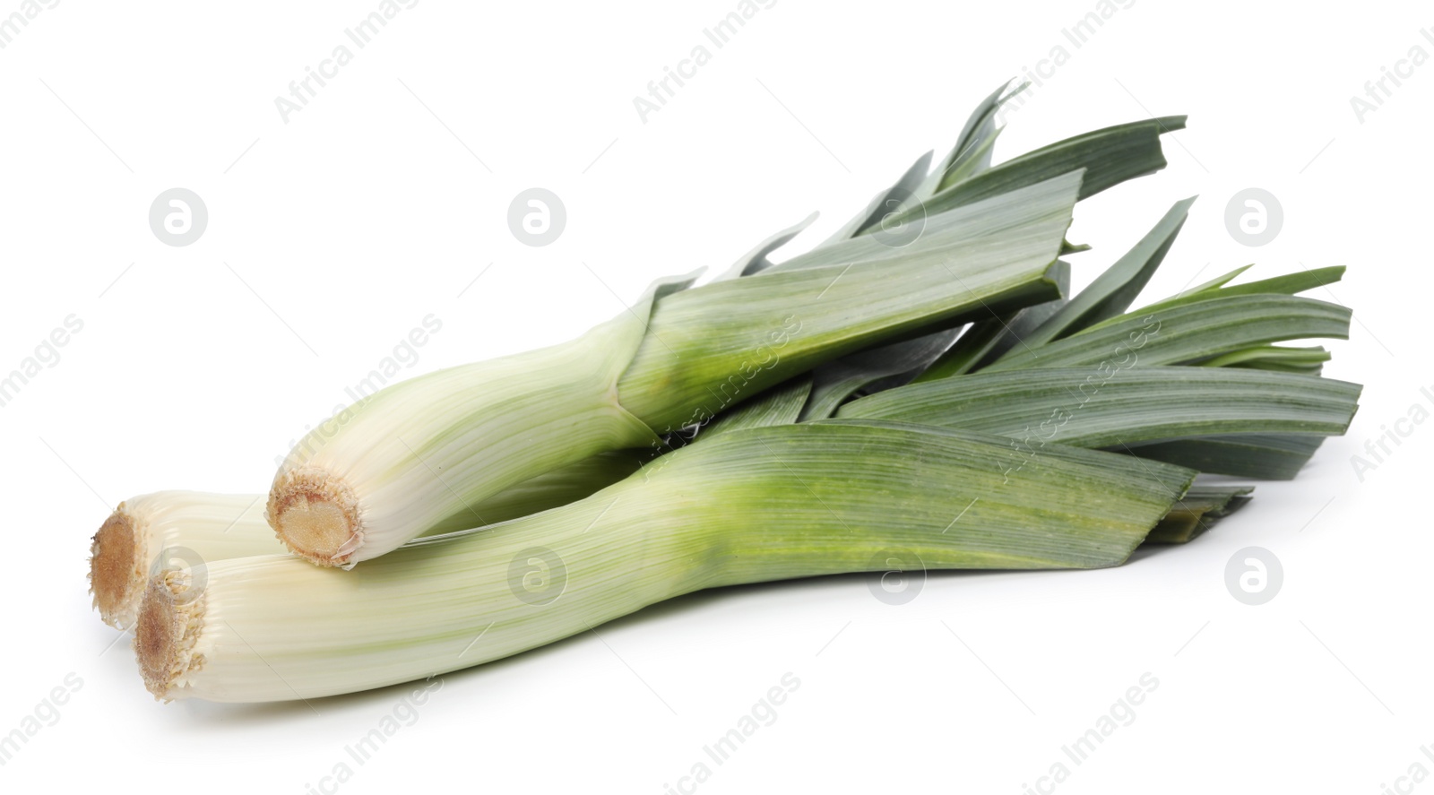 Photo of Fresh raw leeks on white background. Ripe onion