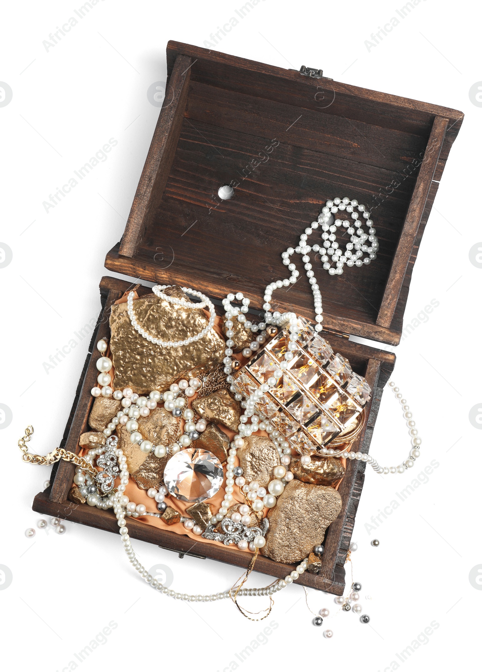Photo of Wooden chest with treasures isolated on white, top view