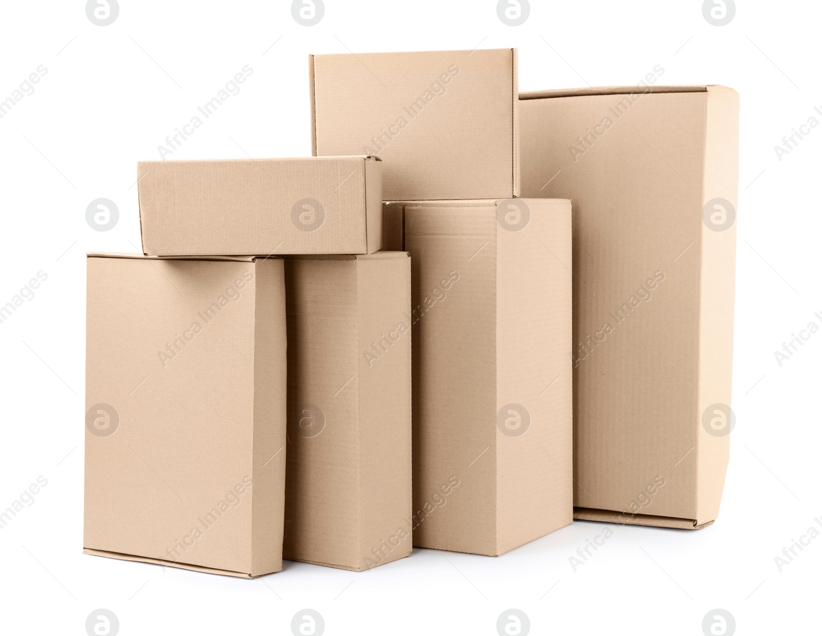 Photo of Pile of cardboard boxes on white background