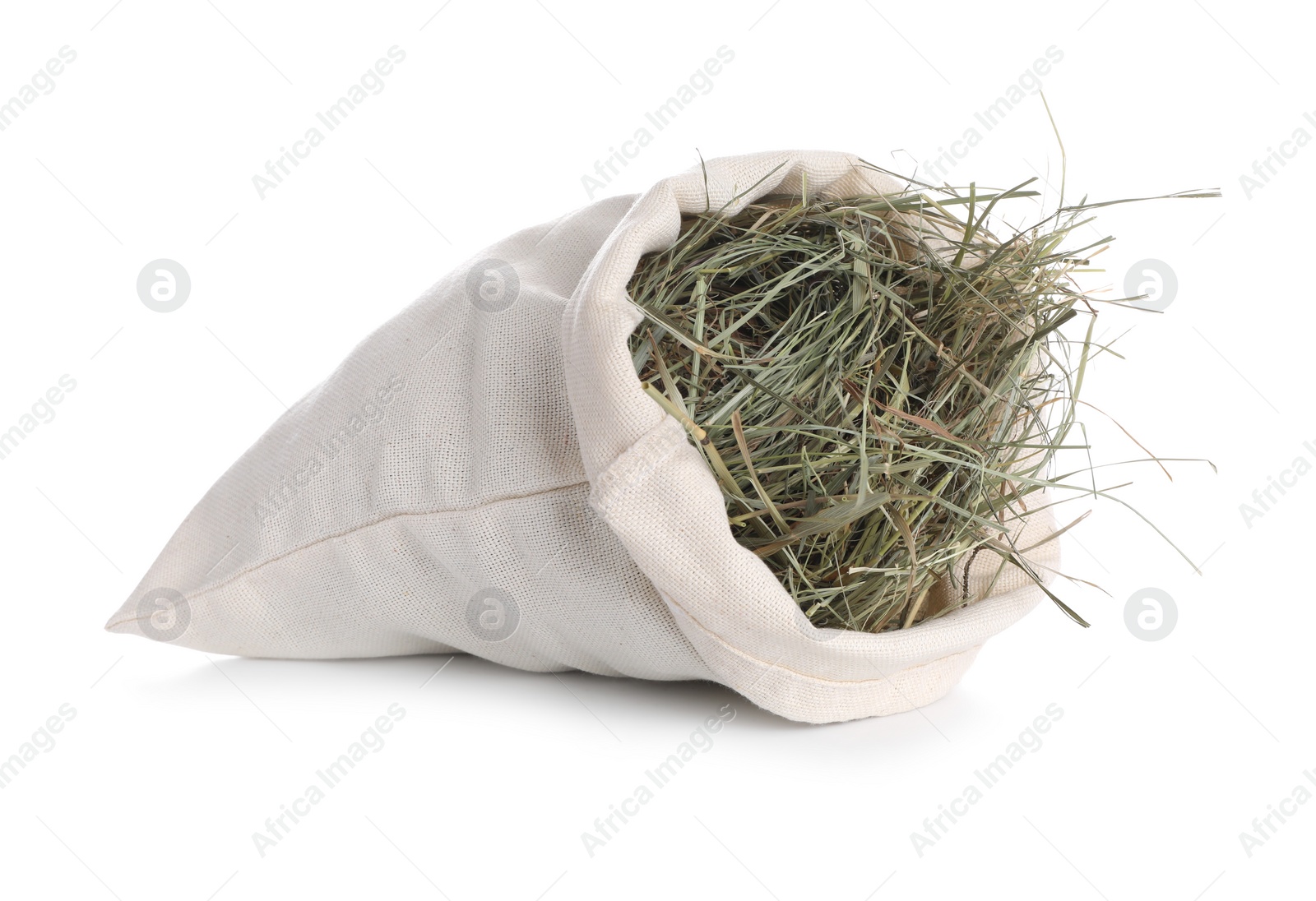 Photo of Dried hay in burlap sack isolated on white