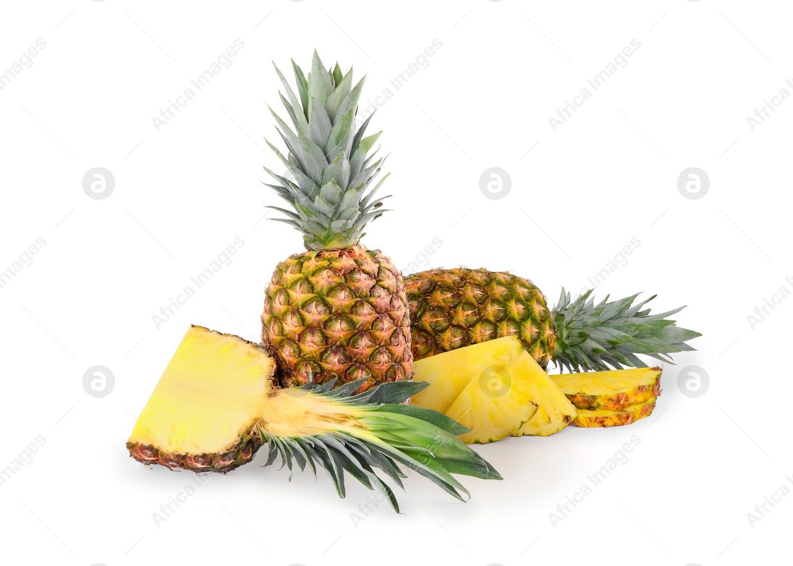 Image of Cut and whole pineapples isolated on white