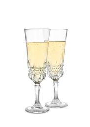 Glasses of sparkling champagne isolated on white