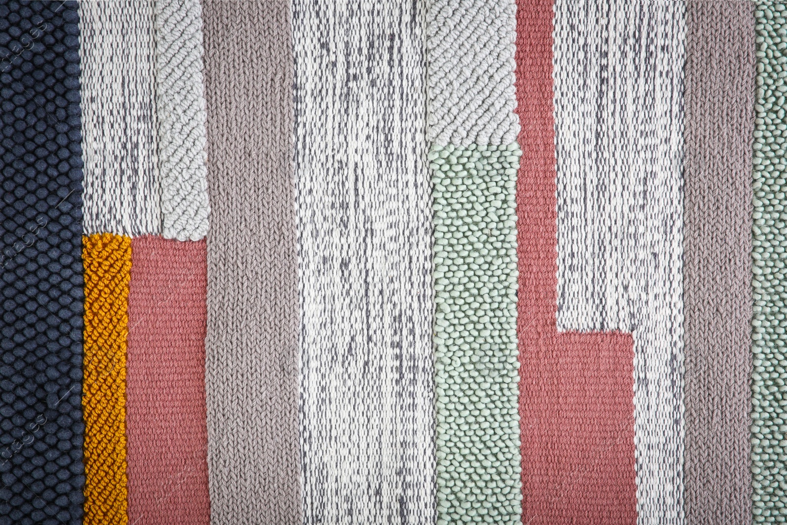 Photo of Colorful striped carpet as background