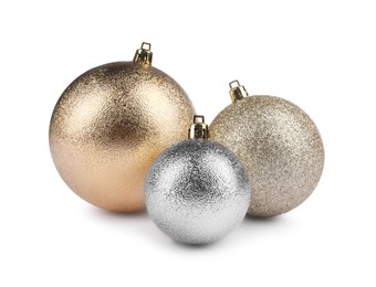 Photo of Beautiful golden and silver Christmas balls isolated on white