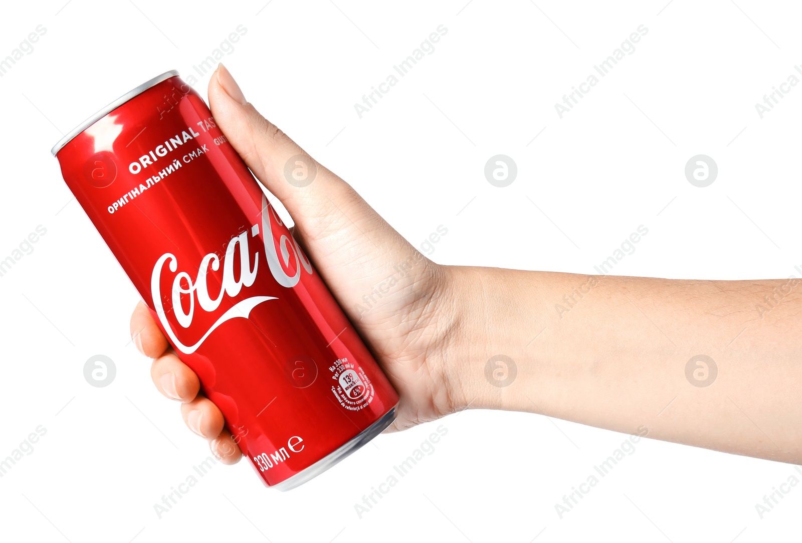 Photo of MYKOLAIV, UKRAINE - NOVEMBER 15, 2018: Woman holding Coca Cola can on white background, closeup