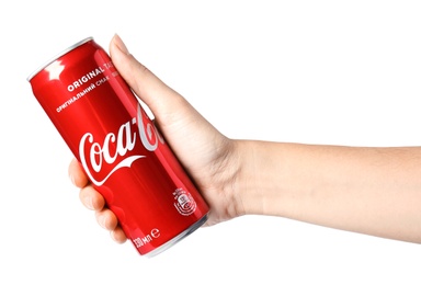 Photo of MYKOLAIV, UKRAINE - NOVEMBER 15, 2018: Woman holding Coca Cola can on white background, closeup