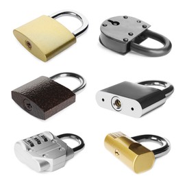 Set with different metal padlocks on white background