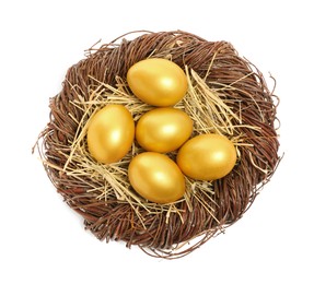 Shiny golden eggs in nest on white background, top view