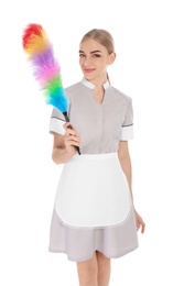 Young chambermaid with dusting brush on white background