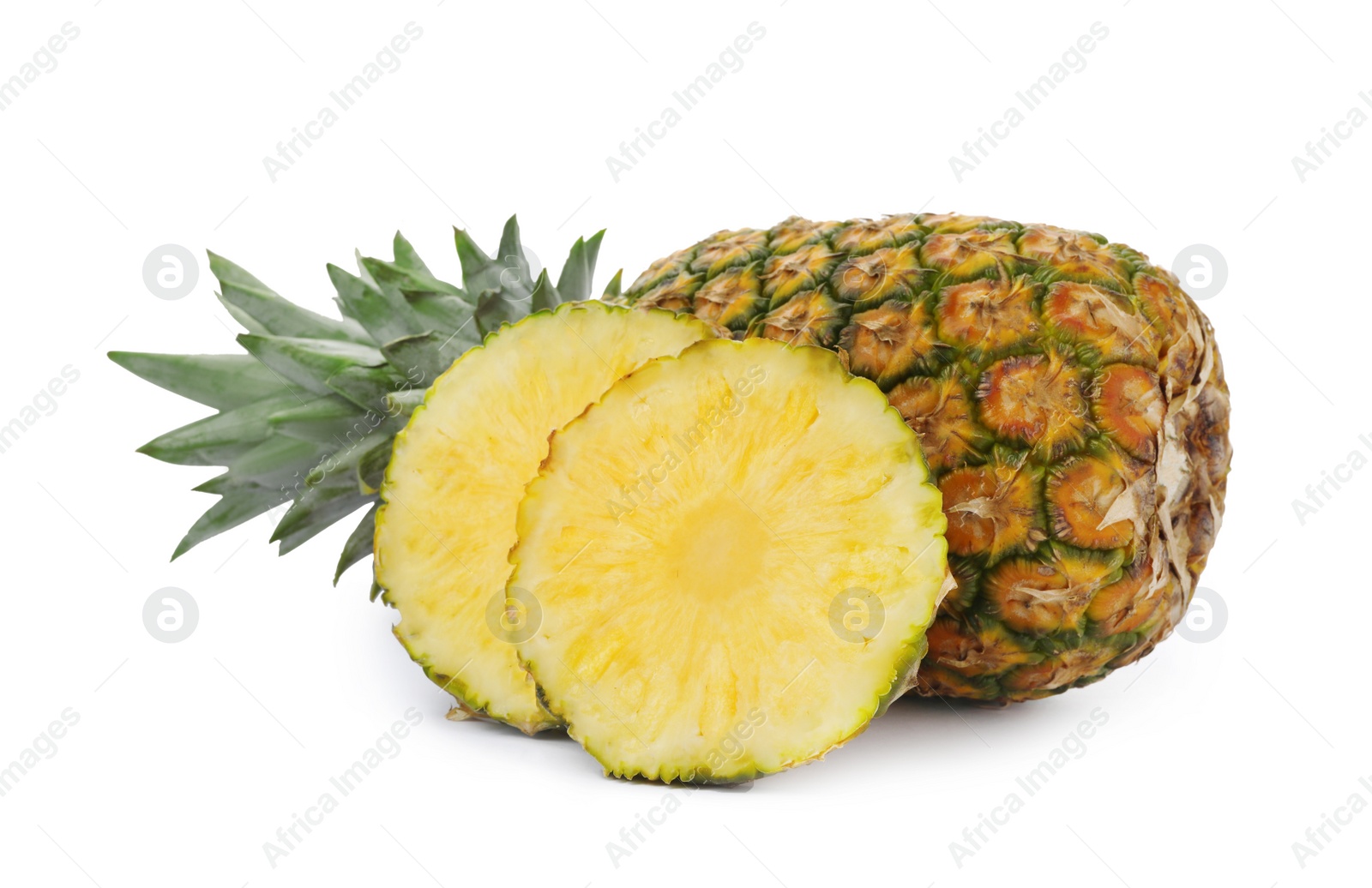Photo of Cut and whole tasty pineapples on white background