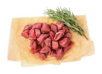 Photo of Pieces of raw beef meat and rosemary isolated on white, top view