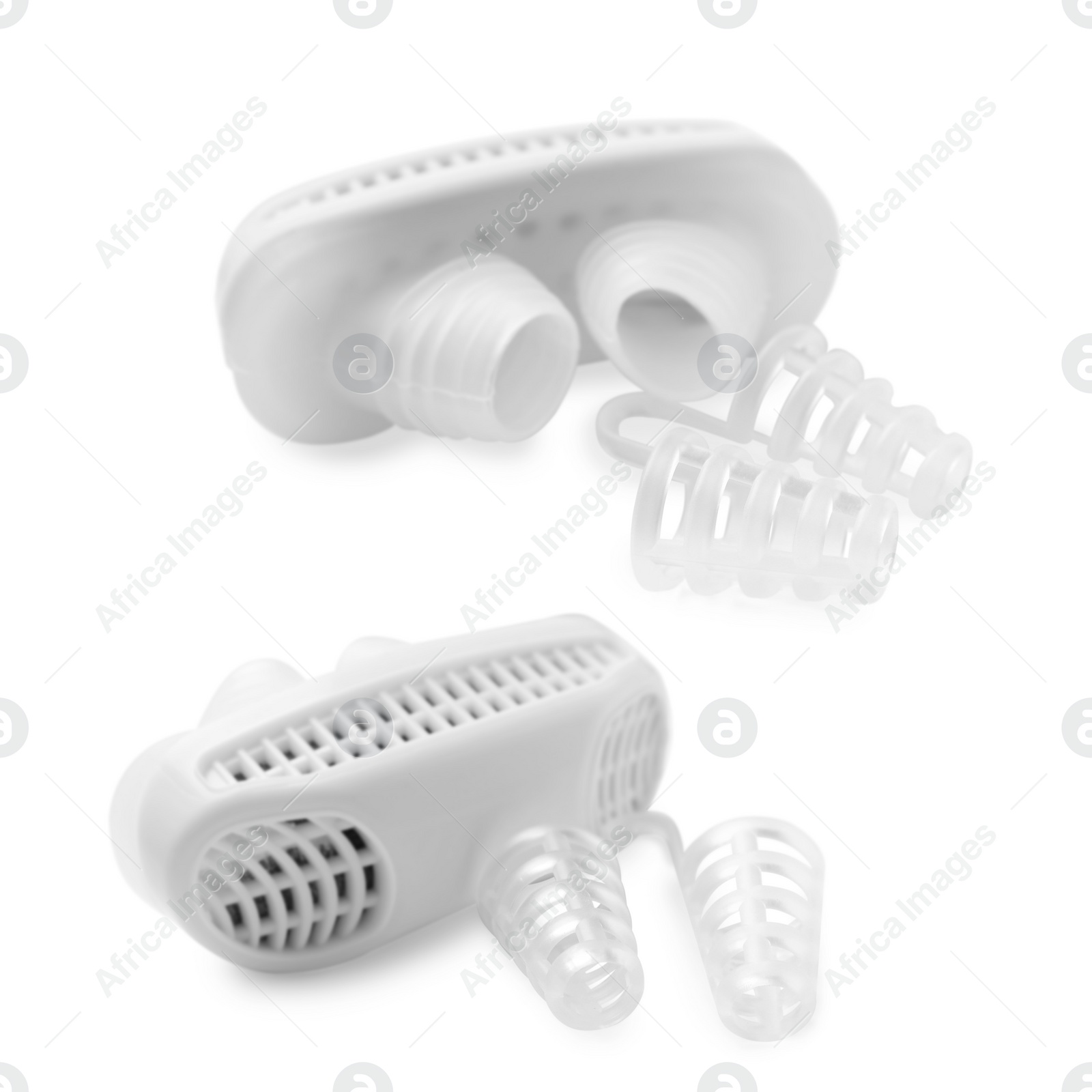 Image of Different anti-snoring devices for nose on white background