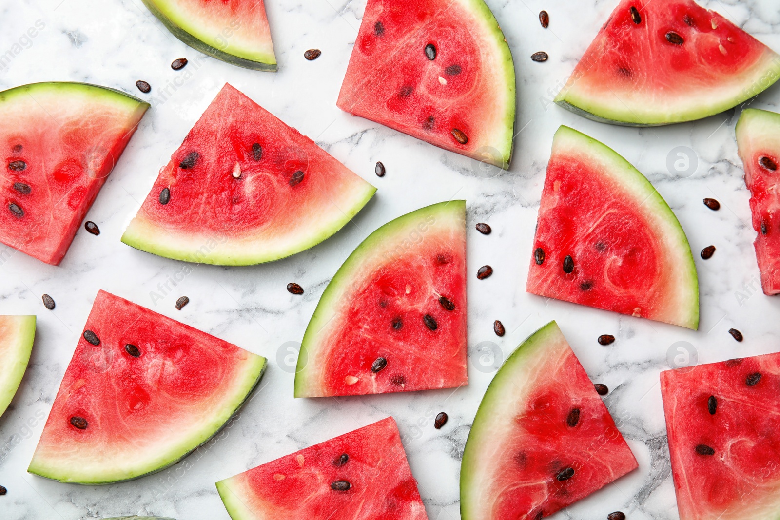 Photo of Flat lay composition with watermelon slices on marble background