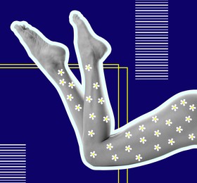 Image of Epilation concept. Young woman showing beautiful legs covered with small flowers on blue background. closeup