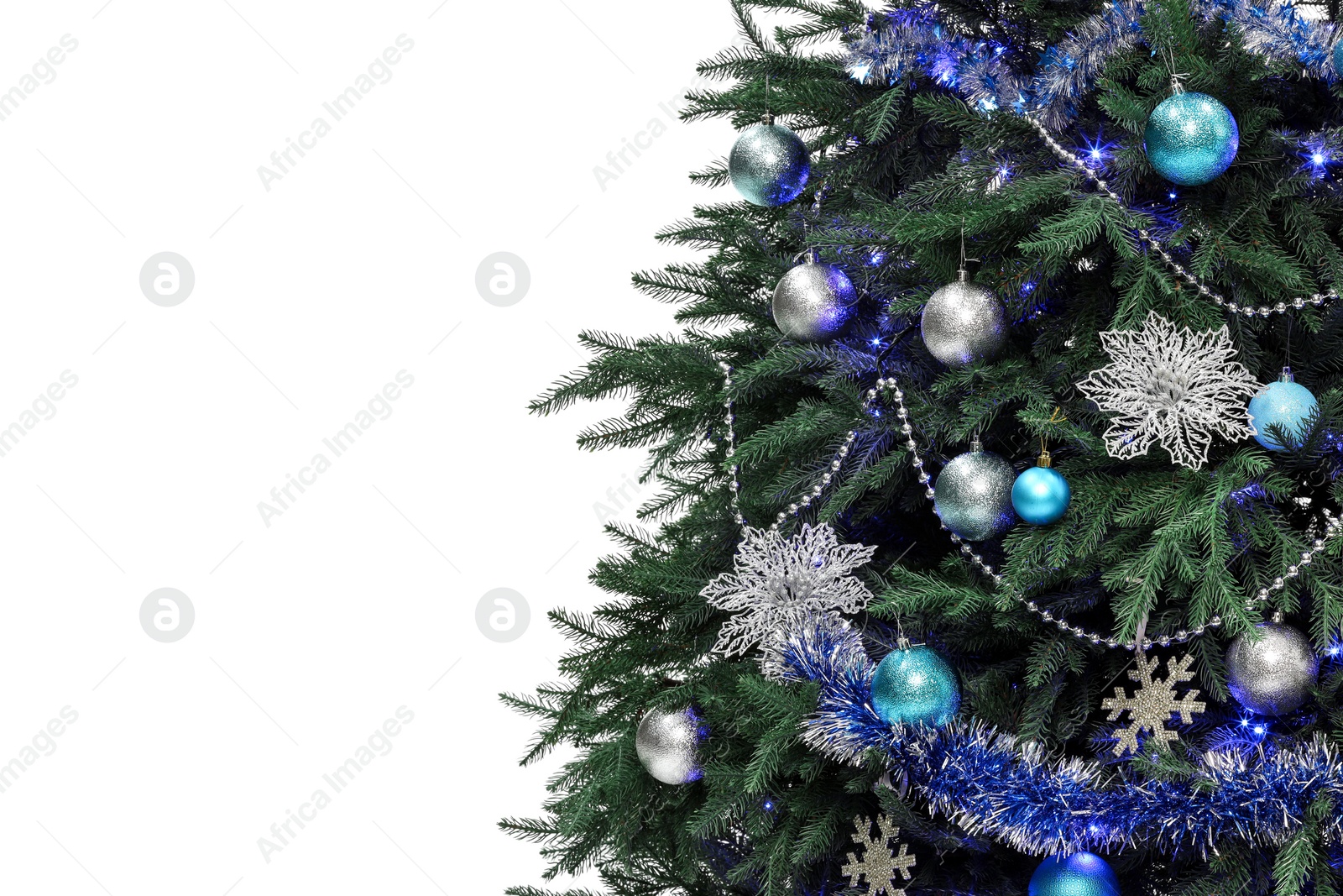 Photo of Beautiful Christmas tree decorated with ornaments and festive lights isolated on white