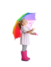 Photo of Little girl with rainbow umbrella on white background