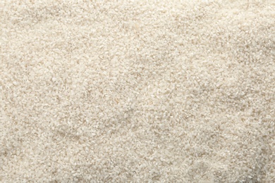 Raw white rice as background. Healthy grains and cereals