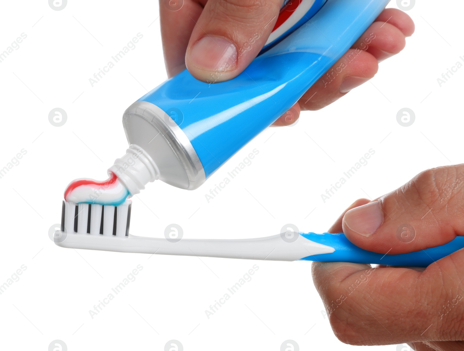 Photo of Man applying toothpaste on brush against white background, closeup