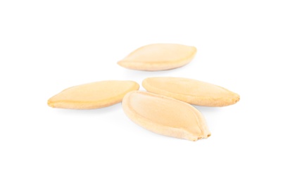 Photo of Raw unpeeled pumpkin seeds on white background