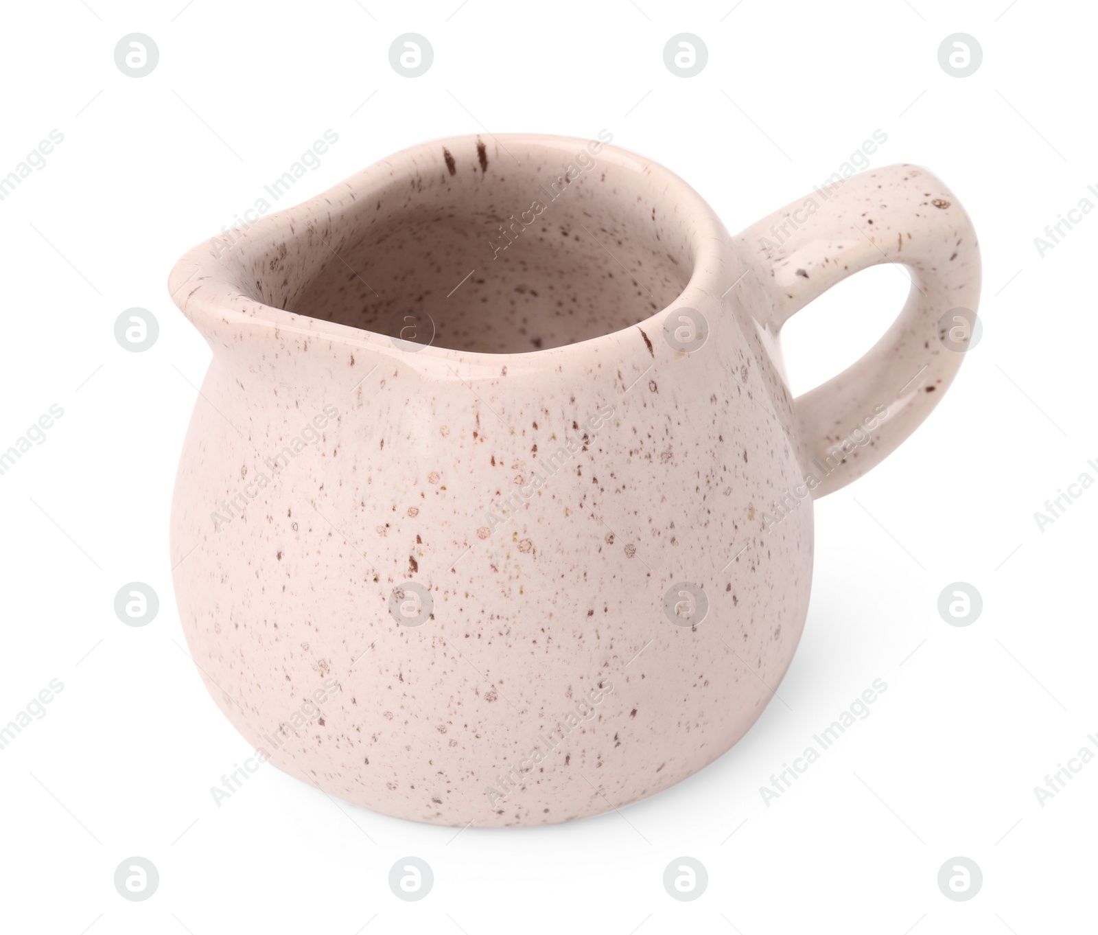 Photo of One ceramic creamer isolated on white. Cooking utensil