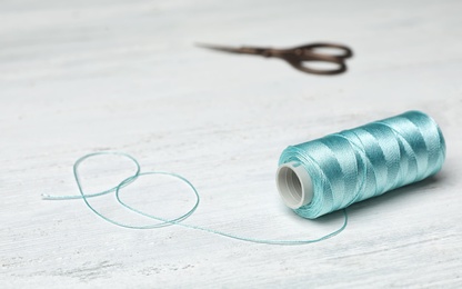 Photo of Color sewing thread on table