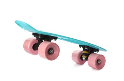 Photo of Turquoise skateboard with pink wheels isolated on white. Sport equipment