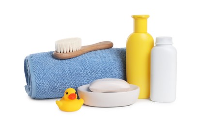 Baby cosmetic products, bath duck, brush and towel isolated on white