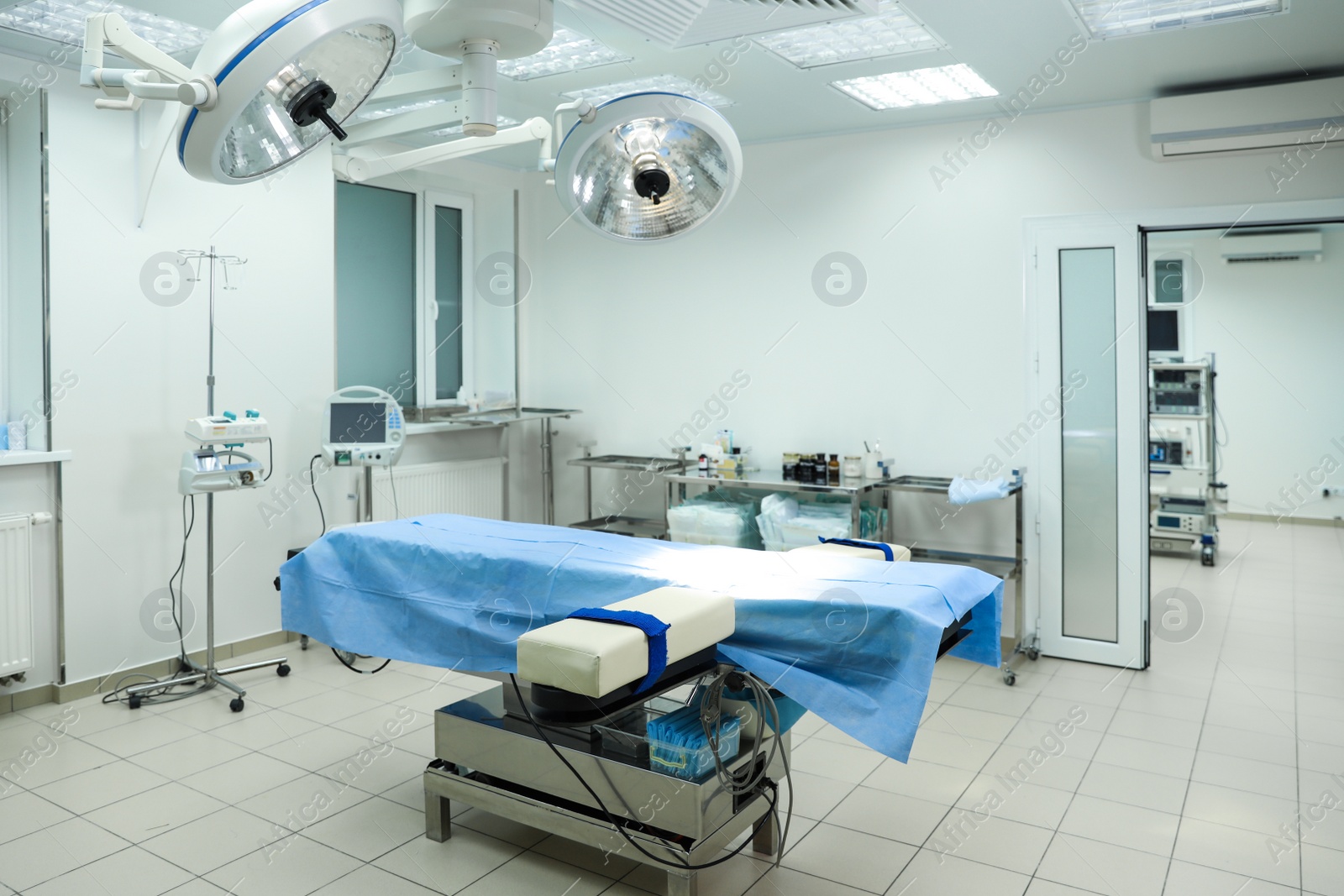 Photo of Surgery room interior with modern equipment in clinic
