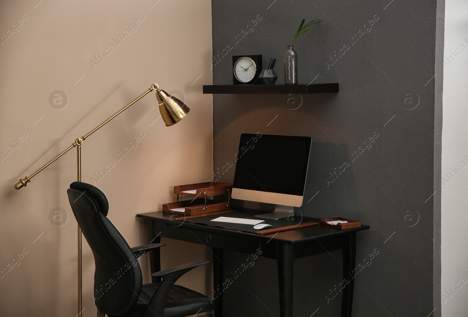 Photo of Modern interior of working place with computer