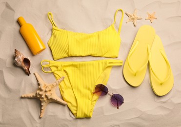 Photo of Flat lay composition with beach objects on sand