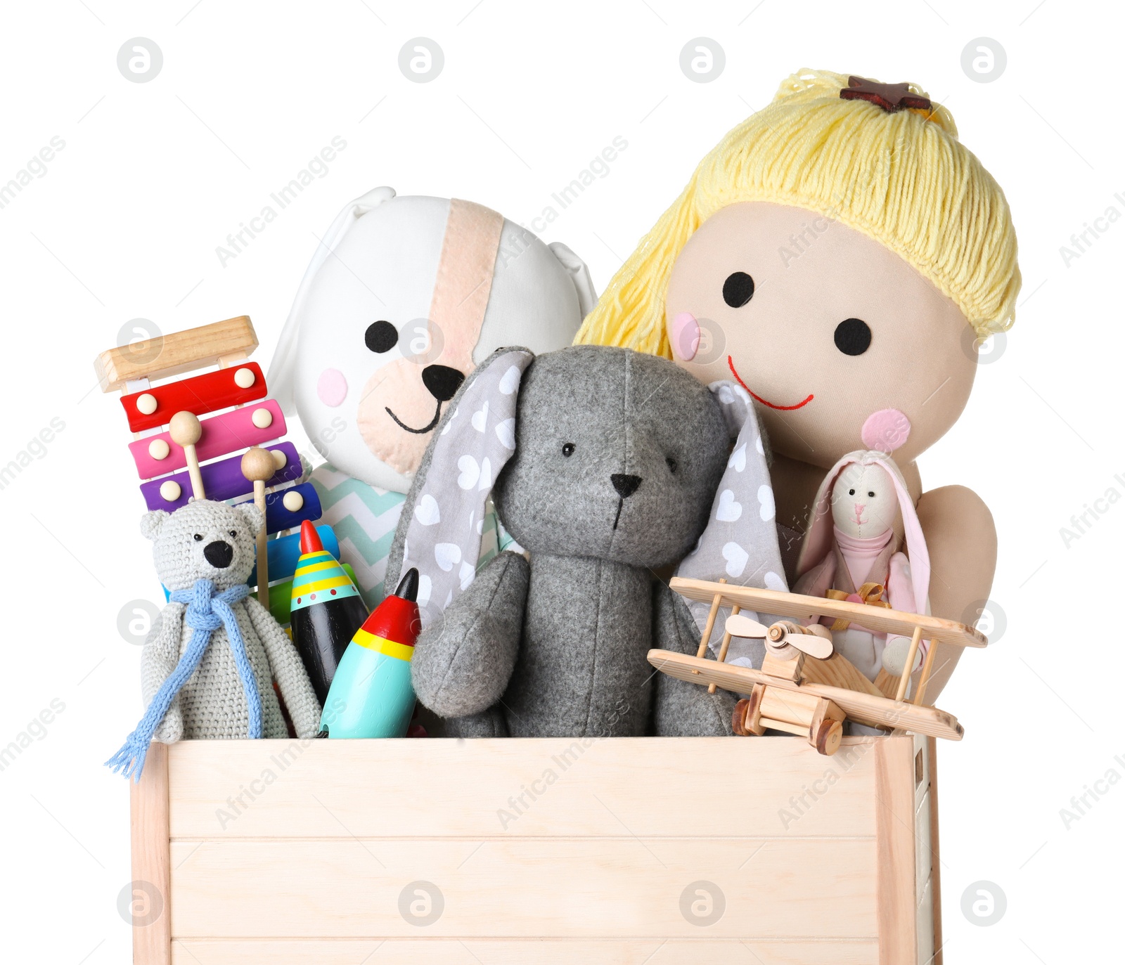 Photo of Wooden crate with different toys isolated on white, closeup
