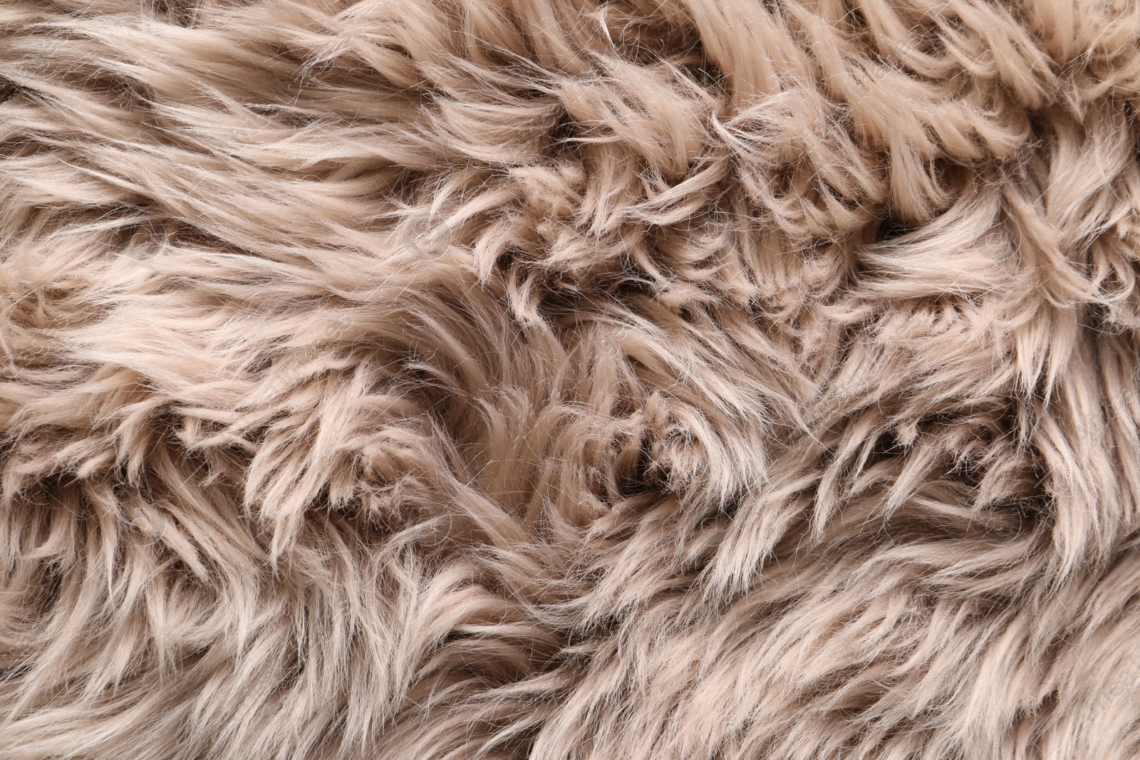 Photo of Texture of faux fur as background, top view