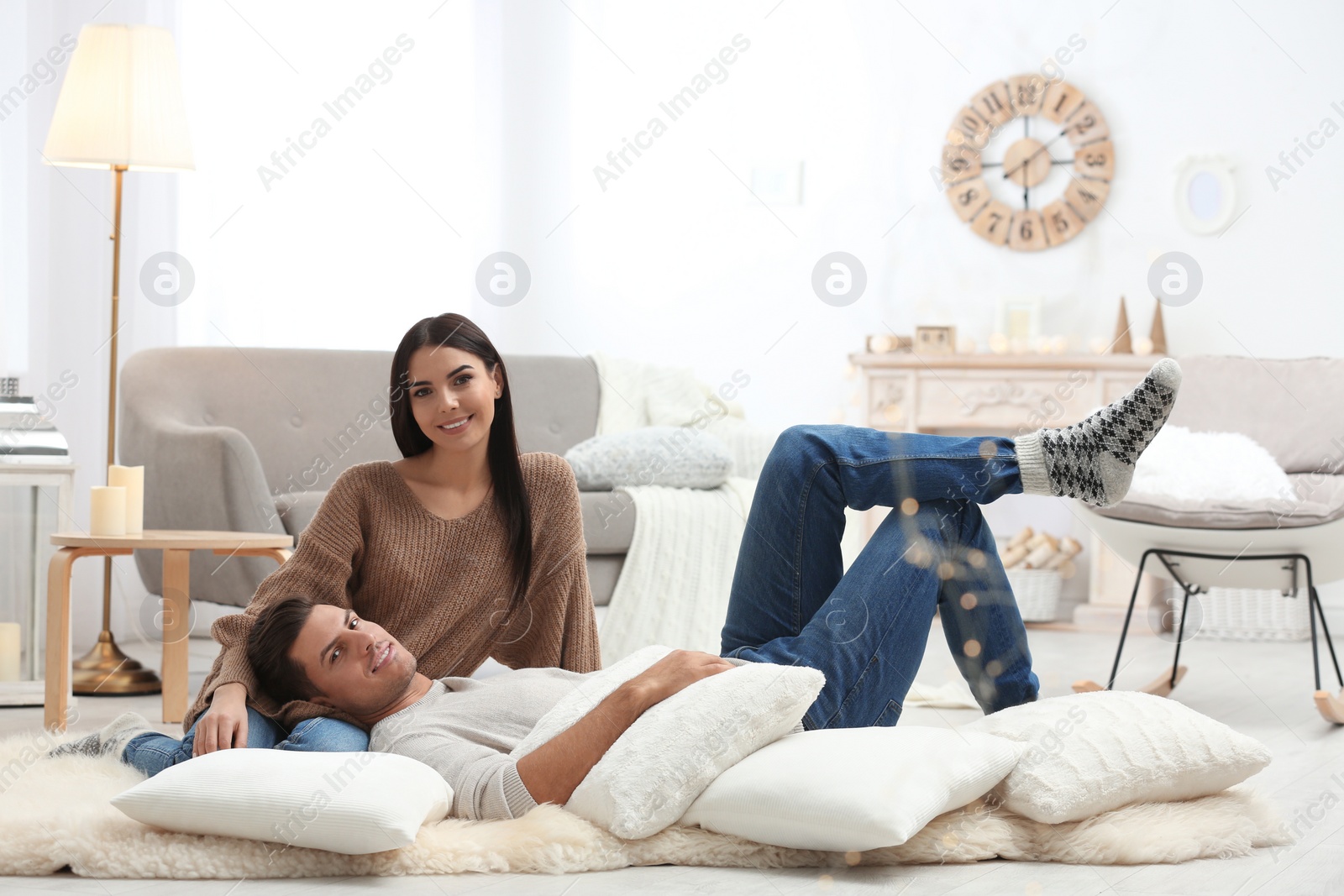 Photo of Happy couple spending time together at home. Winter vacation