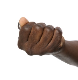 African-American man showing fist on white background, closeup