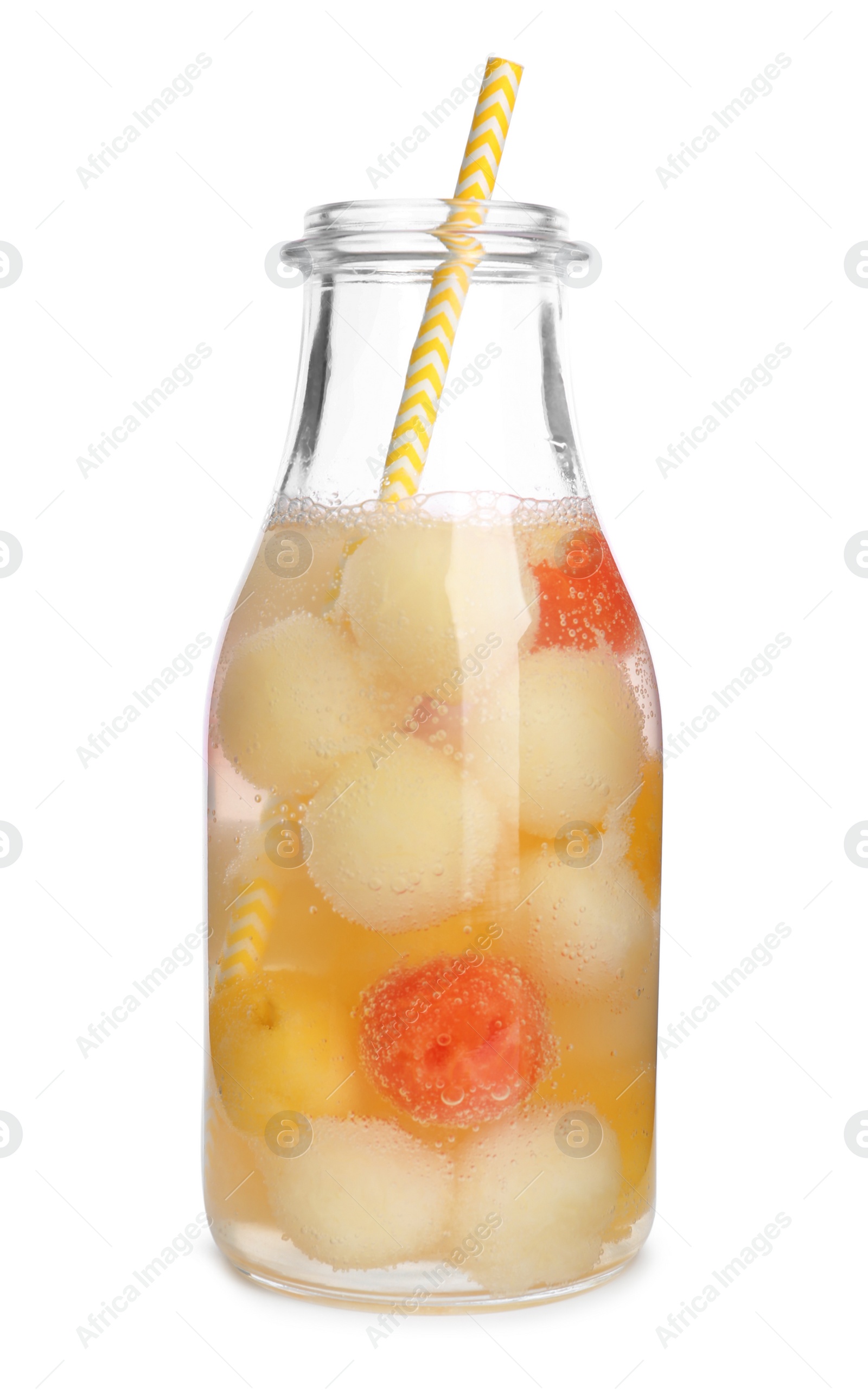 Photo of Glass bottle of melon and watermelon ball cocktail on white background