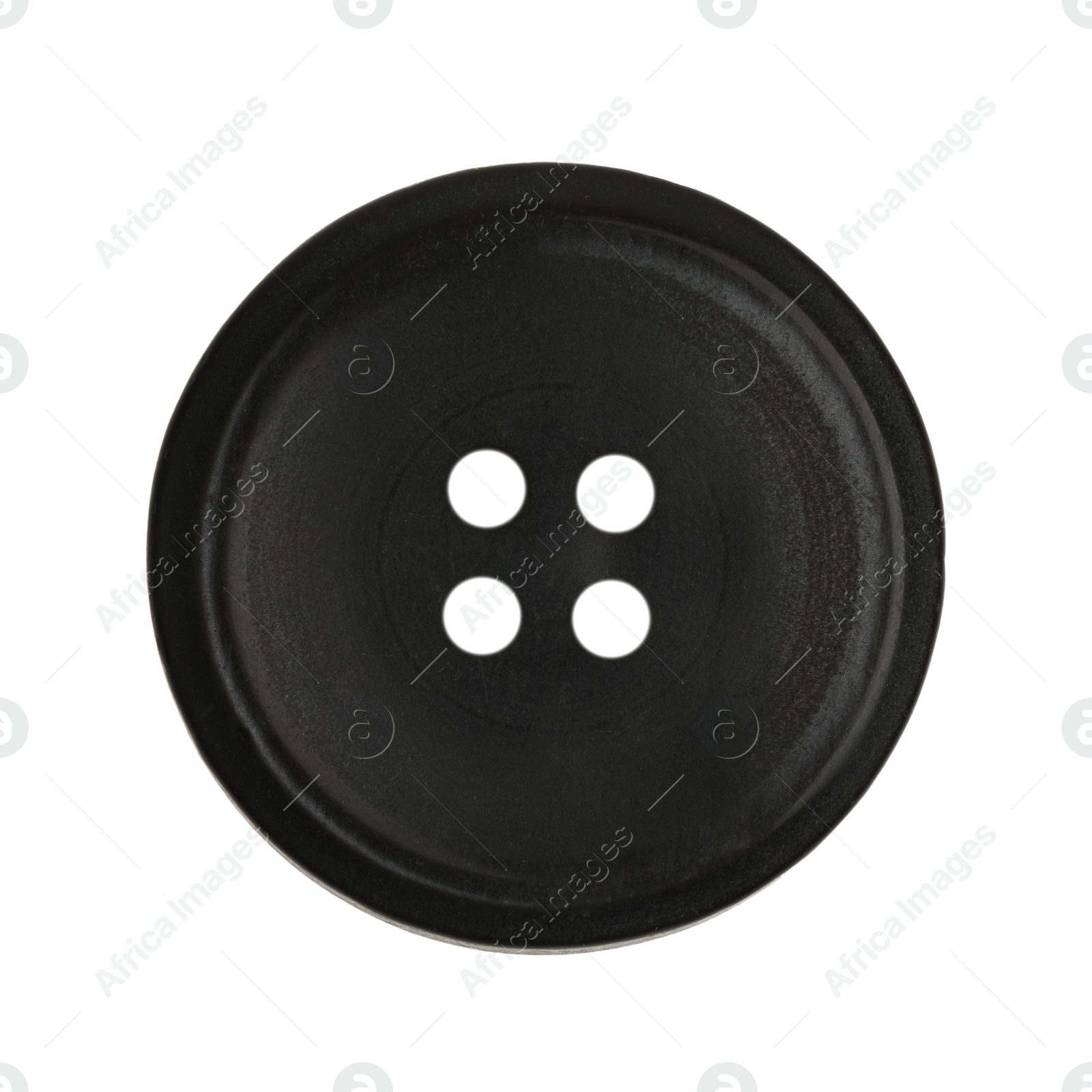 Photo of Black plastic sewing button isolated on white