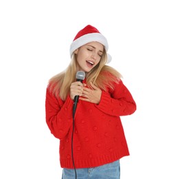 Photo of Happy woman in Santa Claus hat singing with microphone on white background. Christmas music