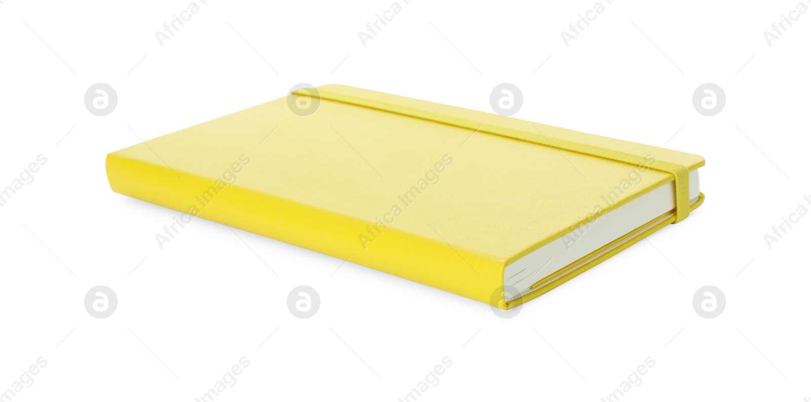 Photo of Closed notebook with blank yellow cover isolated on white